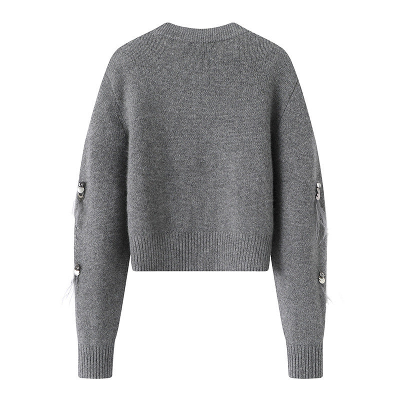 Valencia – קרדיגן סריג עם פאייטים ופרנזים בנוכחות אלגנטית לחורף