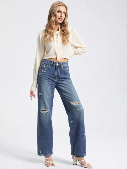 CALYNE – ג’ינס מותן גבוהה בגזרה רחבה עם קרעים ושטיפה בהירה